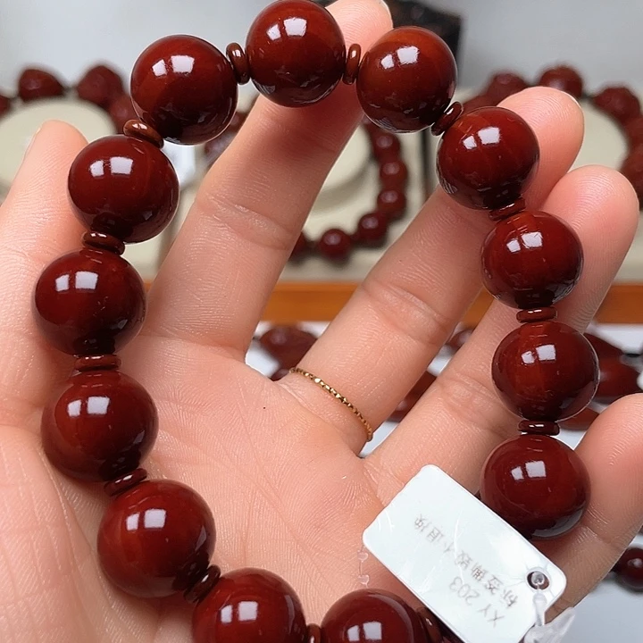 橄榄核手串王*鱼玉化光珠