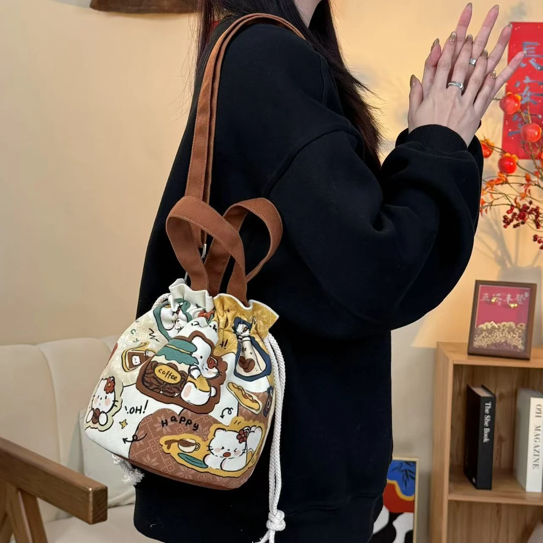 尼睿x劈叉的熊熊 新款原创可爱猫咪印花斜跨手拎束口袋通勤大容量