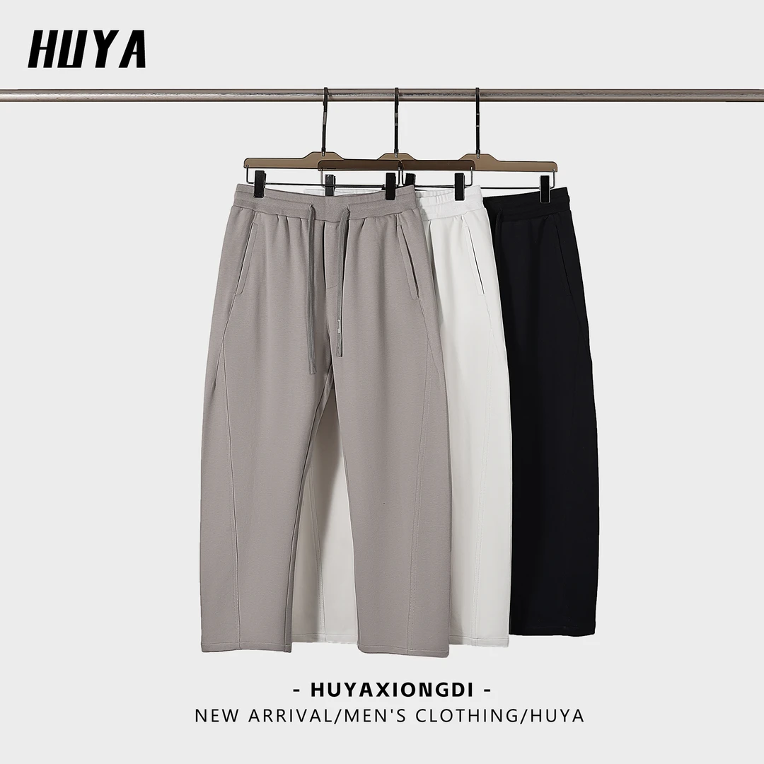 虎牙兄弟男士休闲裤2025春季爆款纯色商务通勤弹力抽绳直筒裤2506