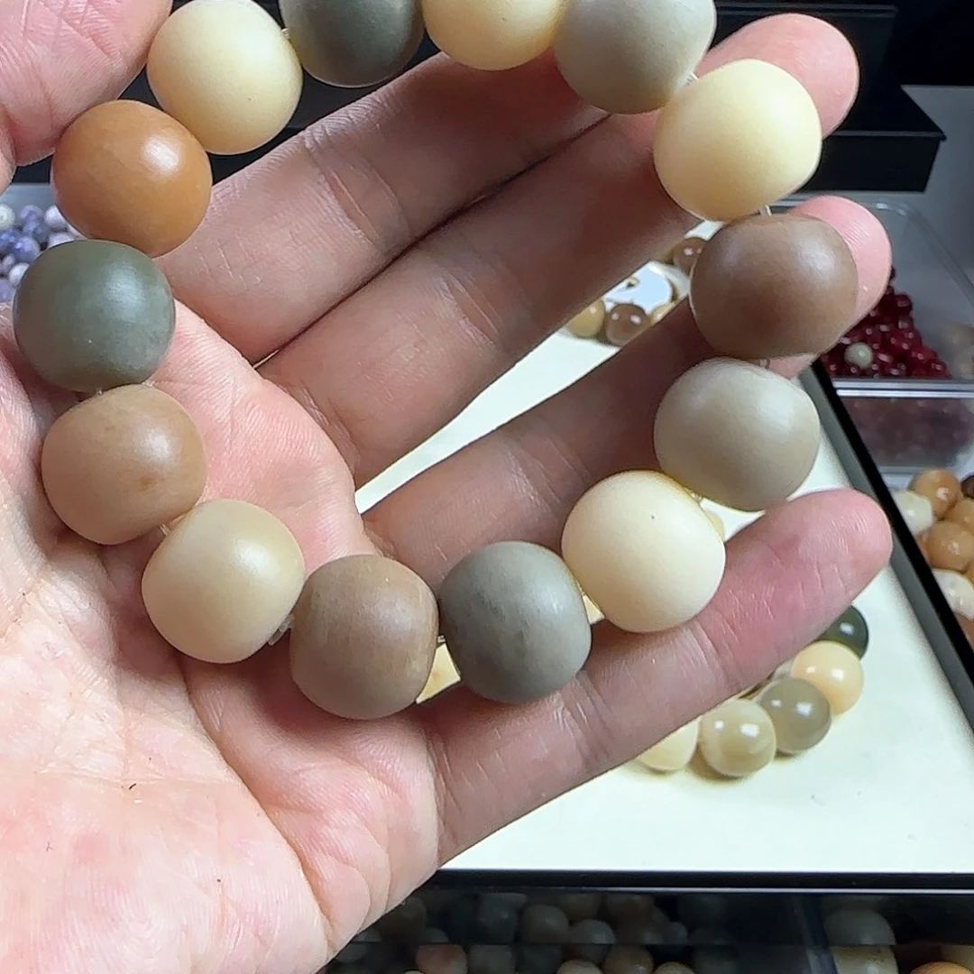 菩提根/象牙果手串爱****卷瑕疵手串一条