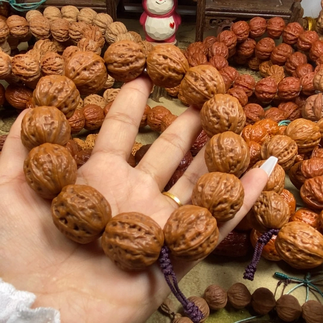 萬***強文玩核桃吊坠八棱手串文玩核桃