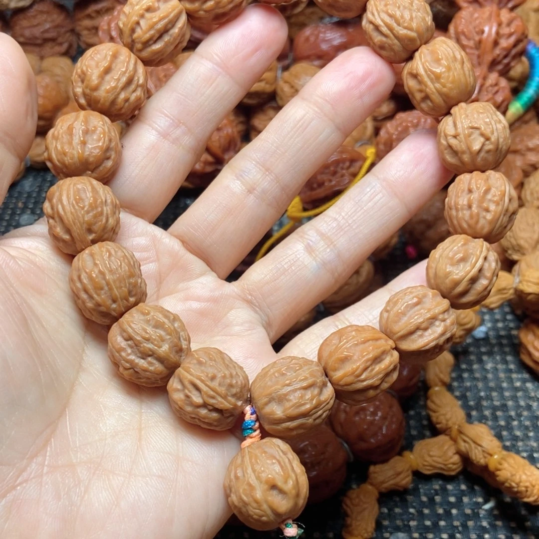 M***绪手串桃核树王手持