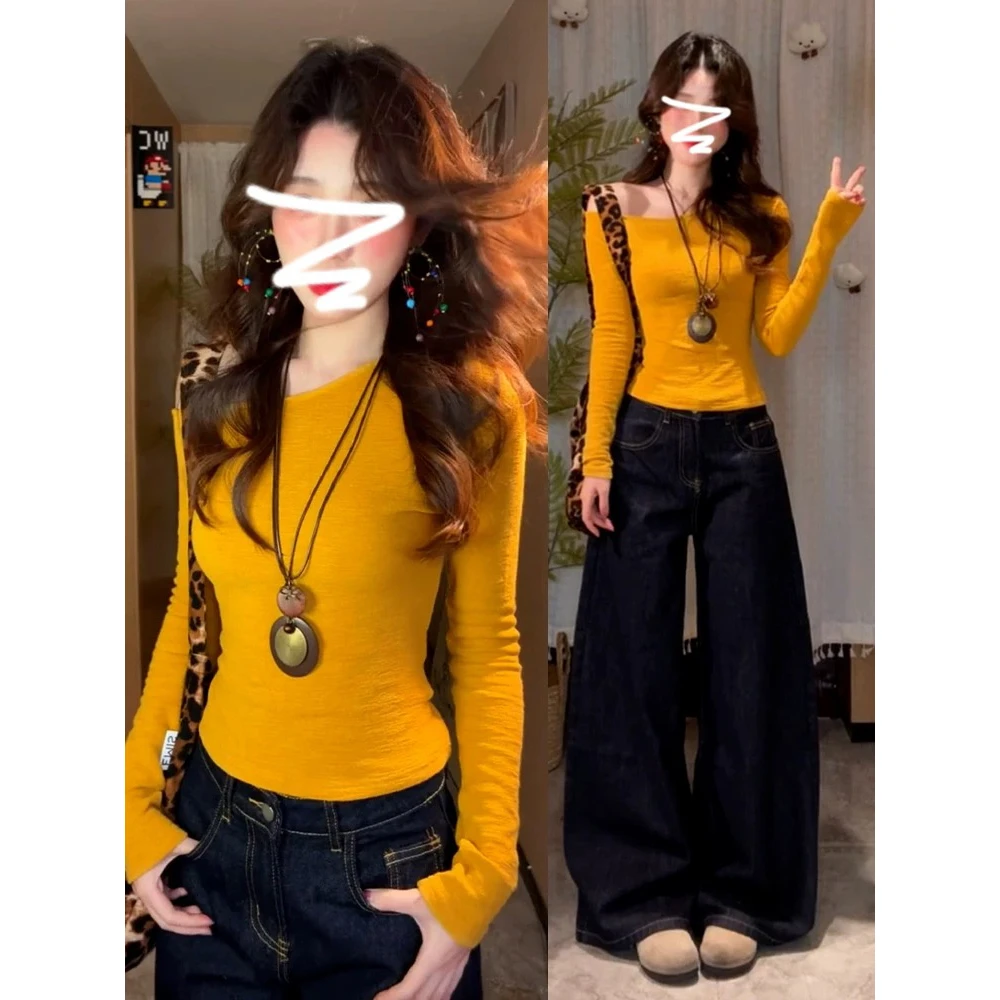 CST美式辣妹风斜领露肩长袖修身黄色T恤女春季设计感显瘦打底上衣