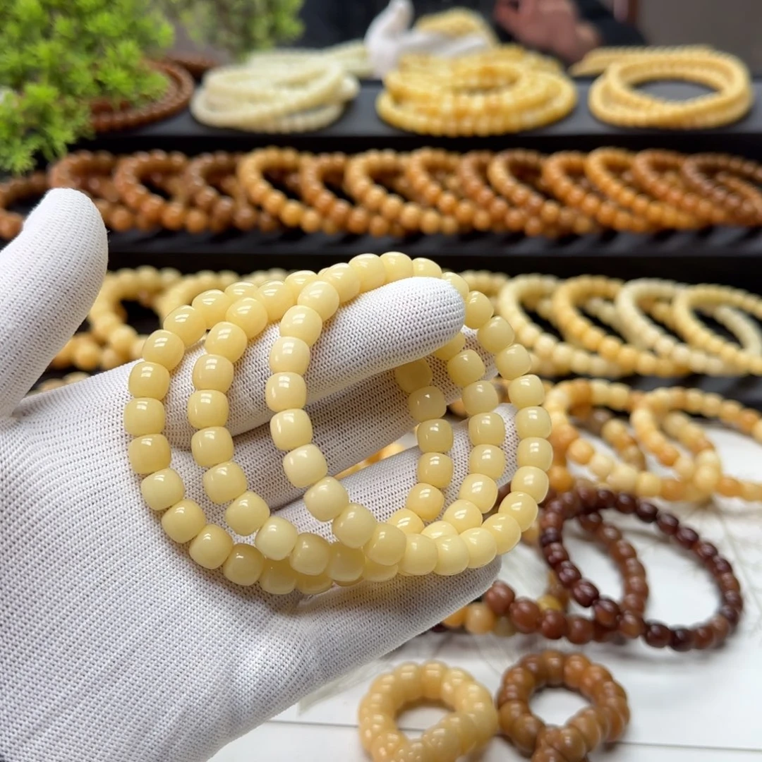 手串菩提根/象牙果8*9精工 10年