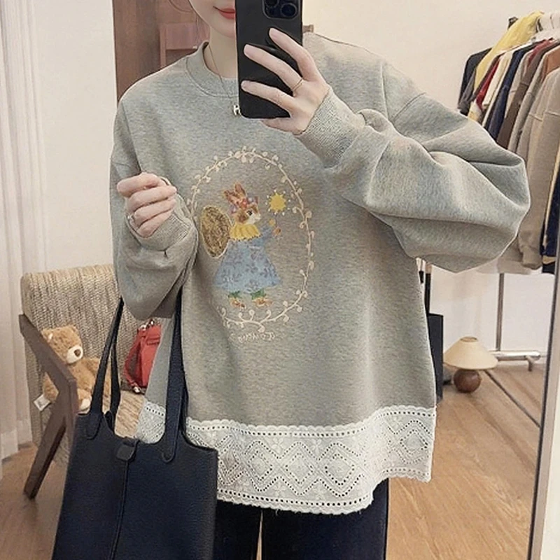 卡通印花拼接圆领套头卫衣女2025新款秋季休闲时尚洋气宽松上衣女