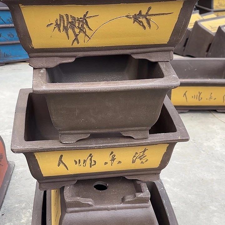 我***我紫砂花盆100-5。   微瑕。黄色