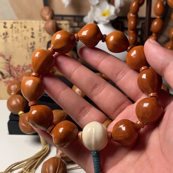 橄榄核其他1.8蜜桃臀老红油核11➕象牙果三通