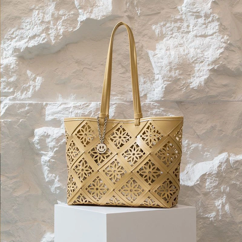 真皮女包秋冬新款小众牛皮子母包大容量手提托特包镂空窗花单肩