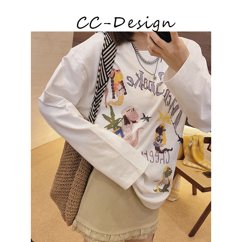 CAICAI-【蛇年行运】早春童趣卡通蛇年涂鸦宽松纯棉长袖T恤女145003