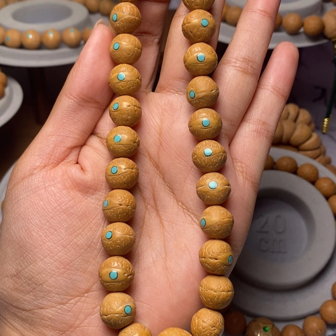 凤眼菩提吊坠手持