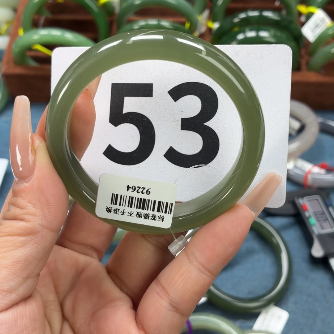 橘***了和田玉未镶嵌手镯