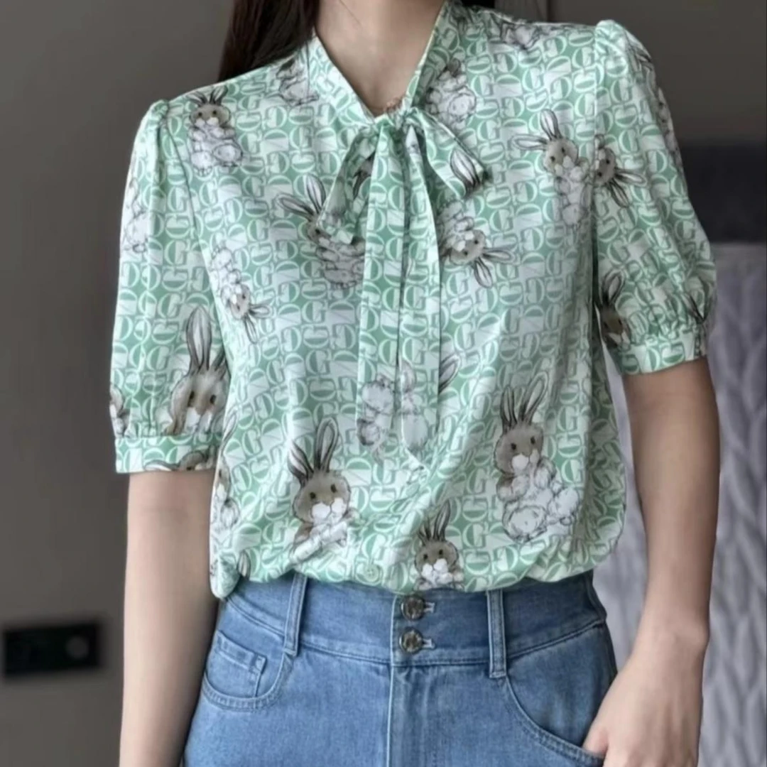 哥弟 薄荷曼波浪漫气质百搭小立领泡泡袖飘带短袖印花衬衫1300766