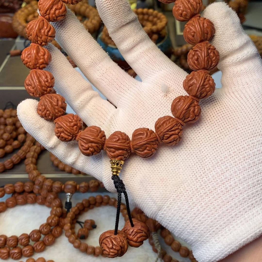 葳***师手串桃核秦岭龙纹