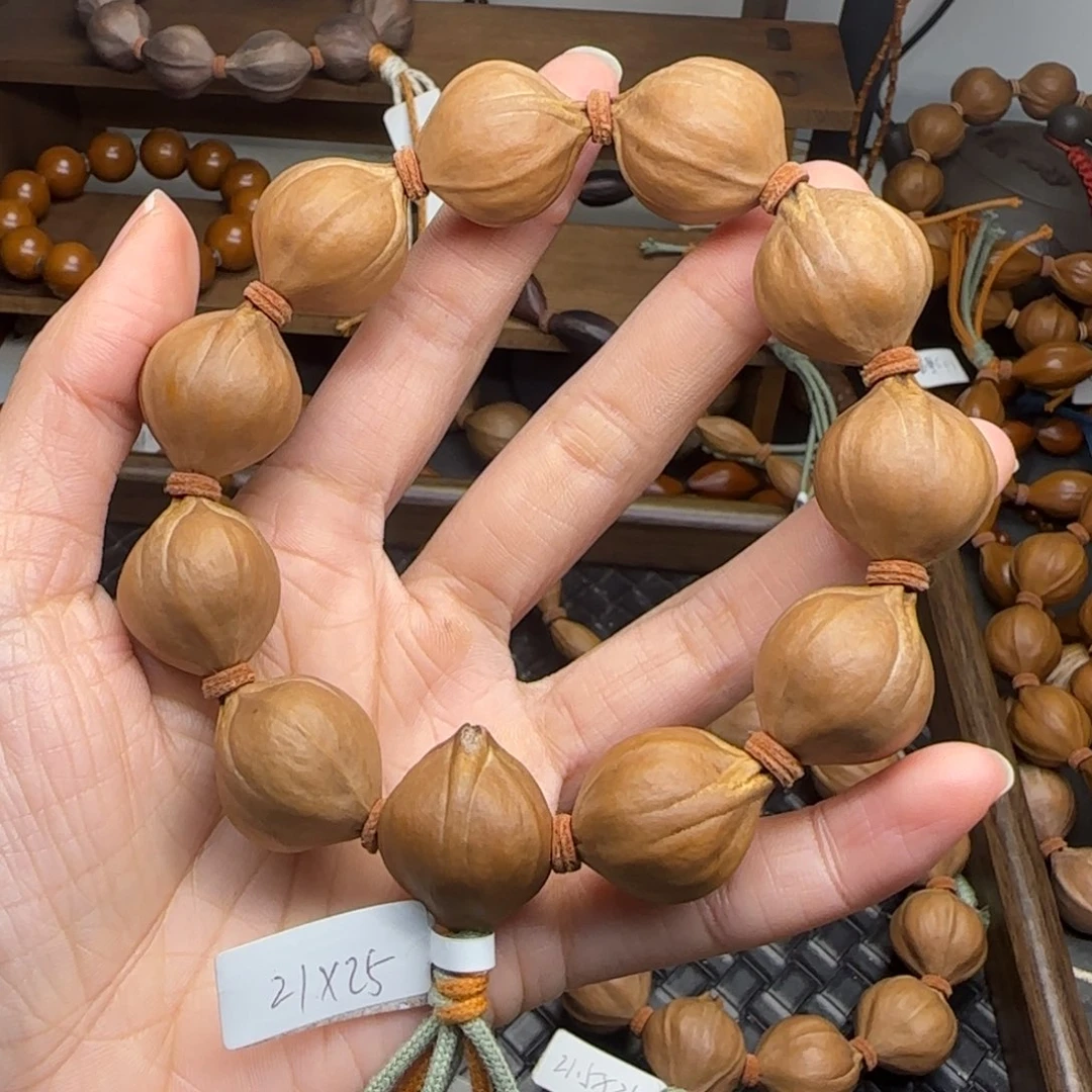 手串橄榄核27。2.1*2.5三花