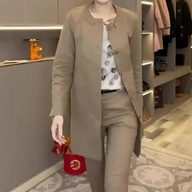 779百搭洋气不规则中长款显瘦气质网红时尚休闲女士系扣外套