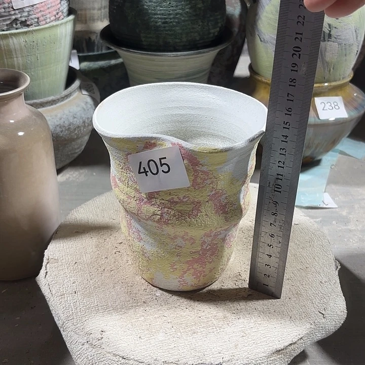 陶摆件高14，口9，到12，有孔，405