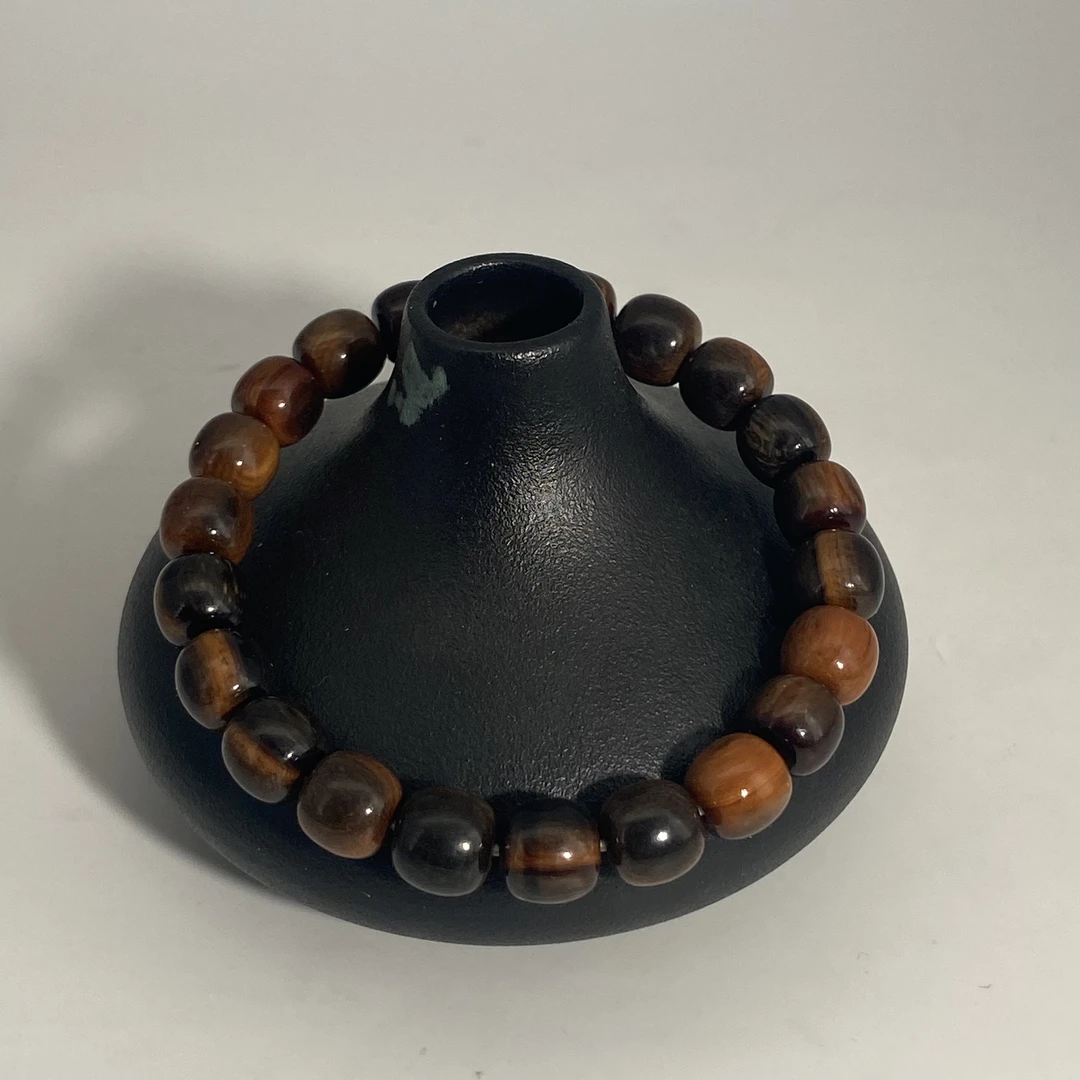 猛犸牙雕深咖猪肝红直切单圈7*8mm假一罚四X50