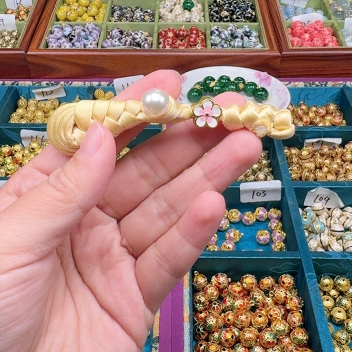 非遗传承手工圆珠扣