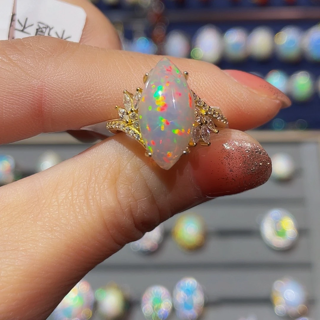 欧泊欧泊戒指银S925镶嵌笑**答