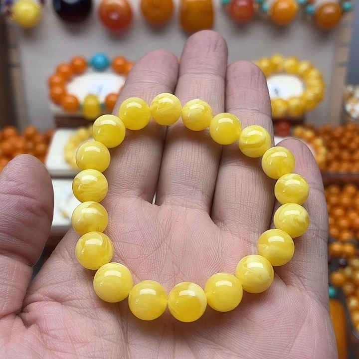 "***星非金属鸡油黄色素串搭配一条