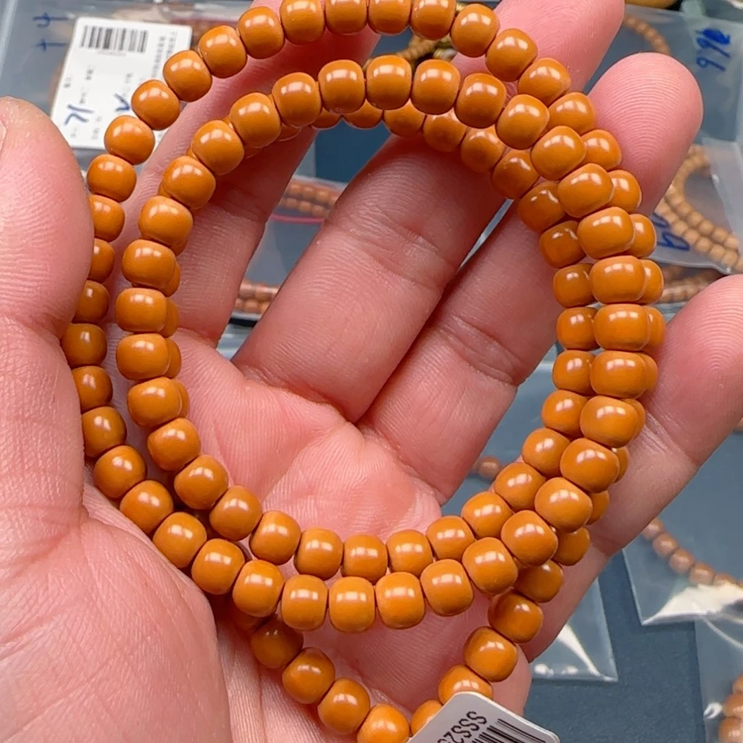 阿***龙手串橄榄核老挝SS级核尖极限弧尺寸6.6全无白