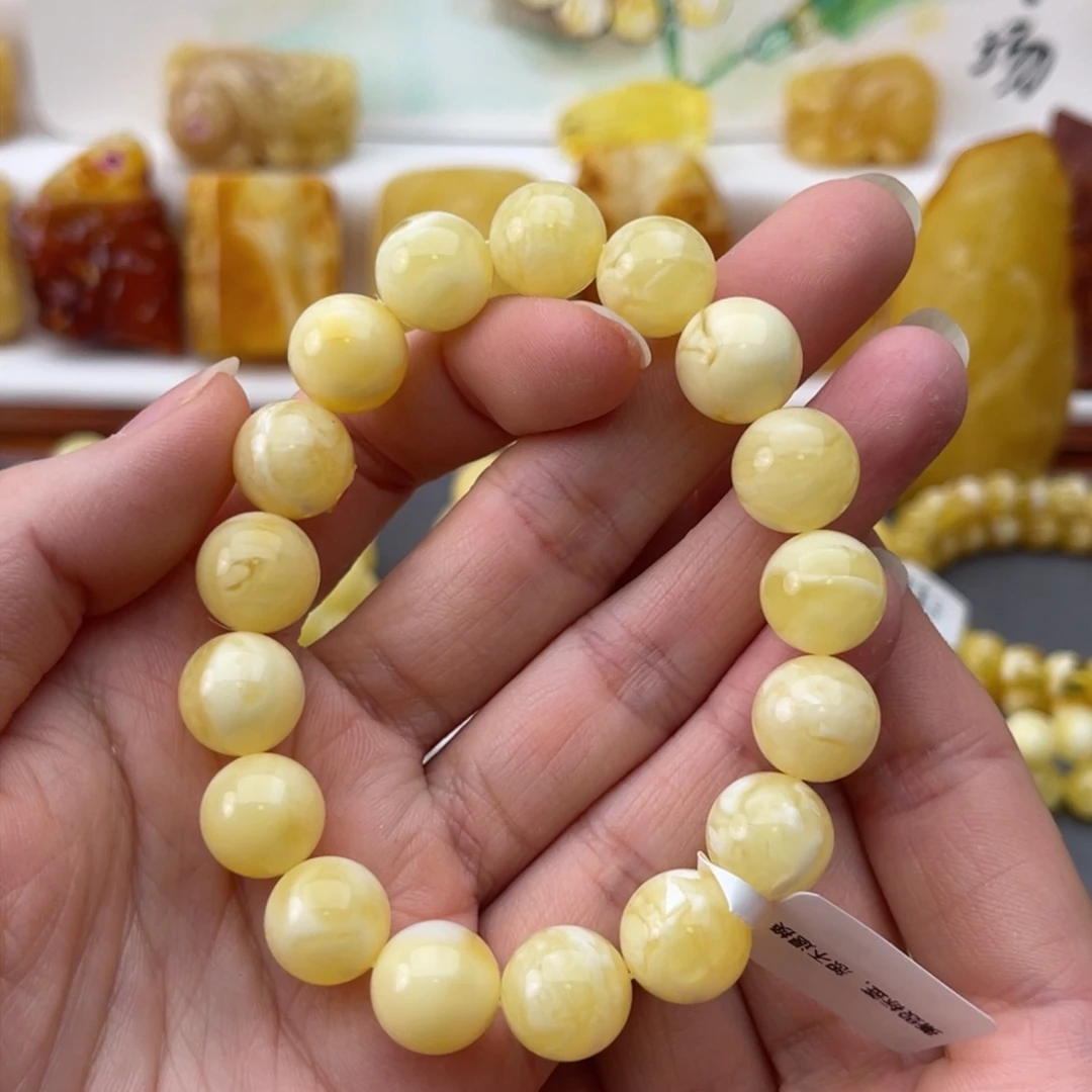 裸石琥珀未镶嵌小***麻蜜蜡圆珠手串鸽