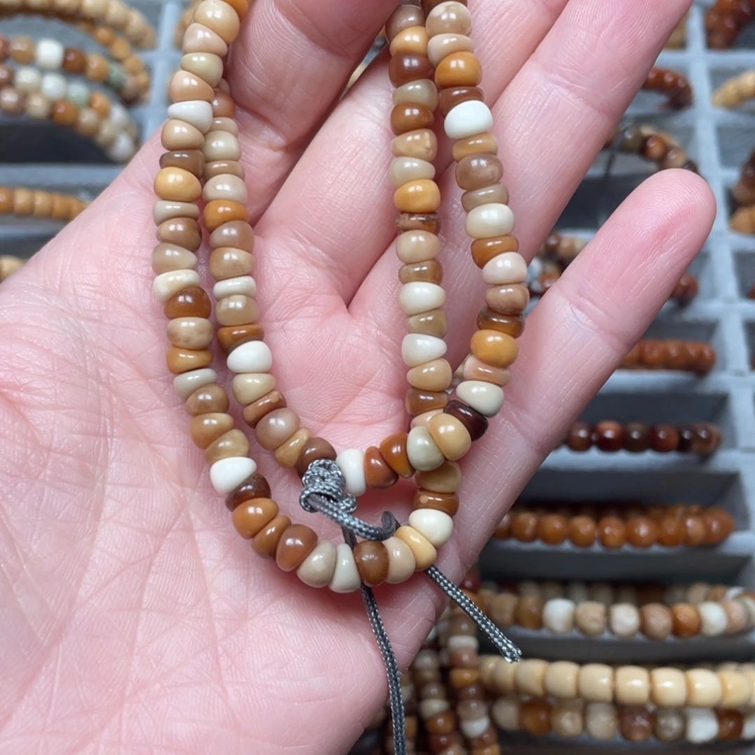 H***o吊坠龙脊菩提卡6.7左右蒜瓣七彩小肠120颗