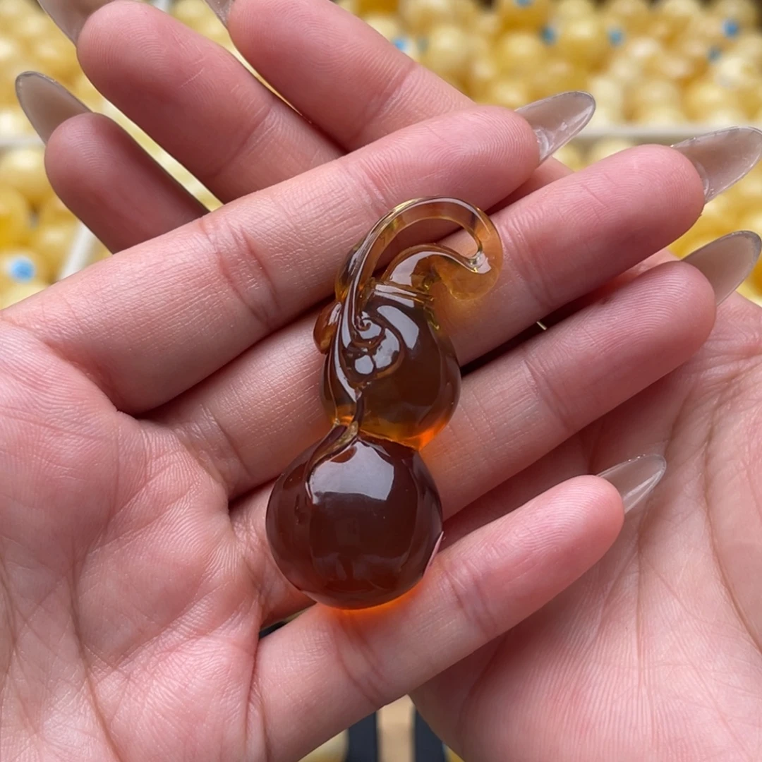 琥珀未镶嵌裸石蜜蜡吊坠笑