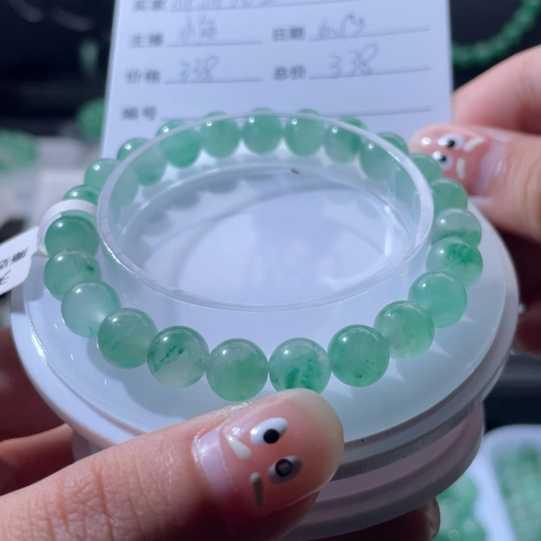 郝***生石英质玉（非洲翠）合金耳钉卡8.5手串