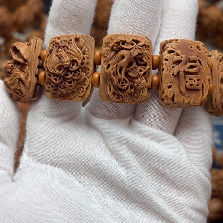 桃核雕刻吉祥八宝手牌