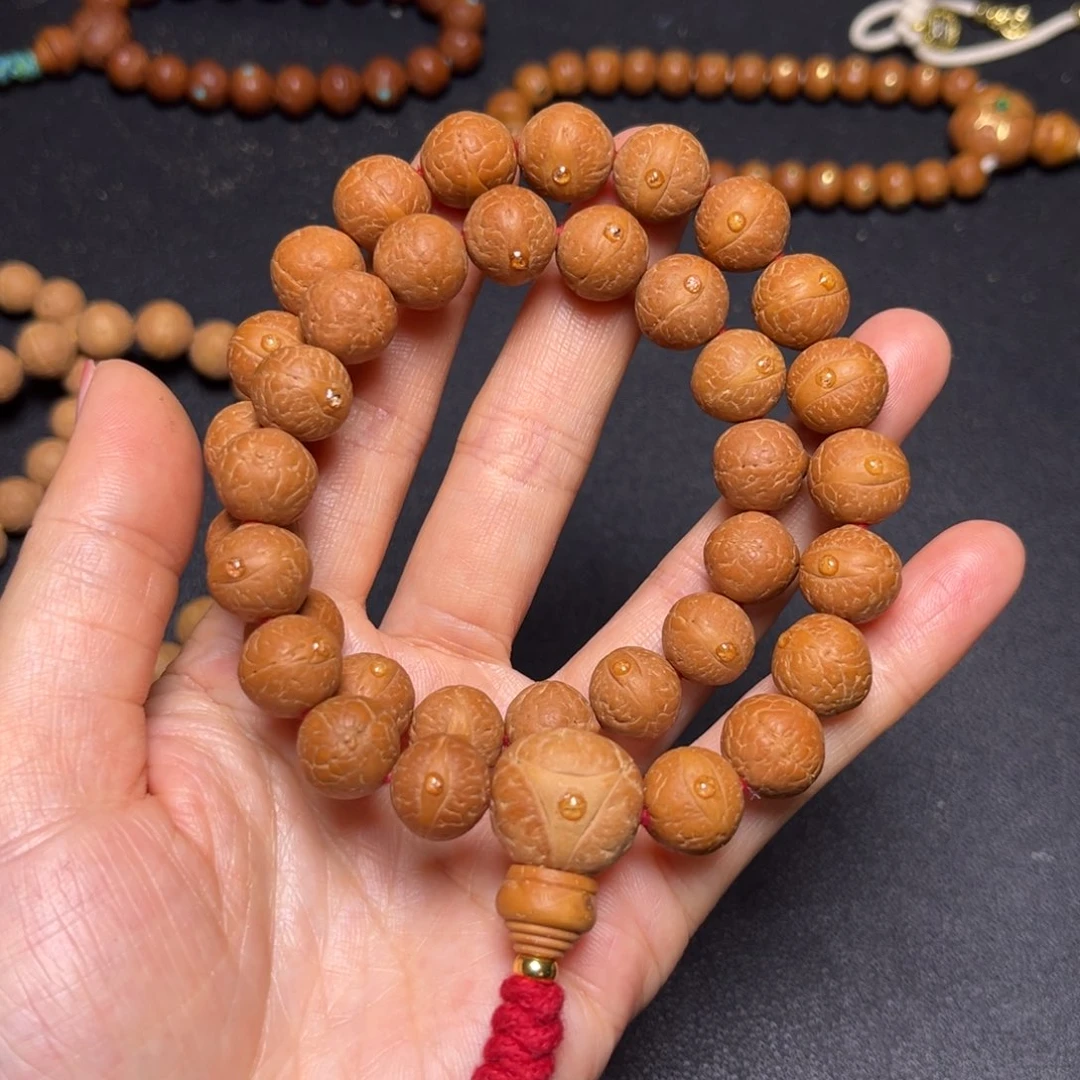 凤眼菩提吊坠12mm36颗精品手持