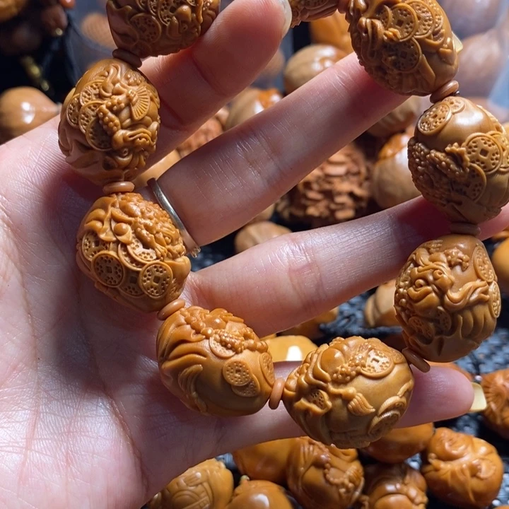 橄榄核吊坠金蟾手串