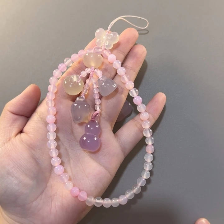 顾***莓玛瑙/玉髓手机挂件未镶嵌