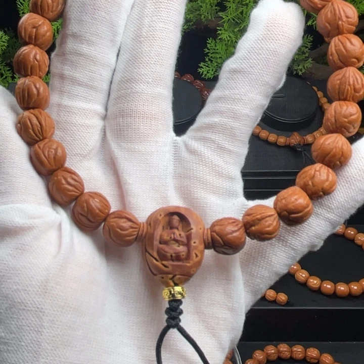 不****桃核吊坠精品手持