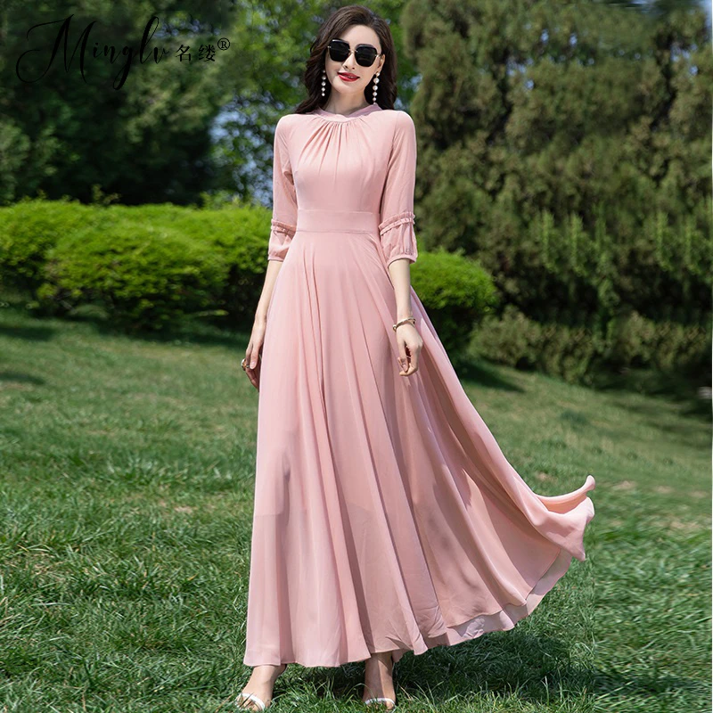 夏季轻奢连衣裙女2025夏季新款长裙七分袖气质大摆沙滩裙海边度假