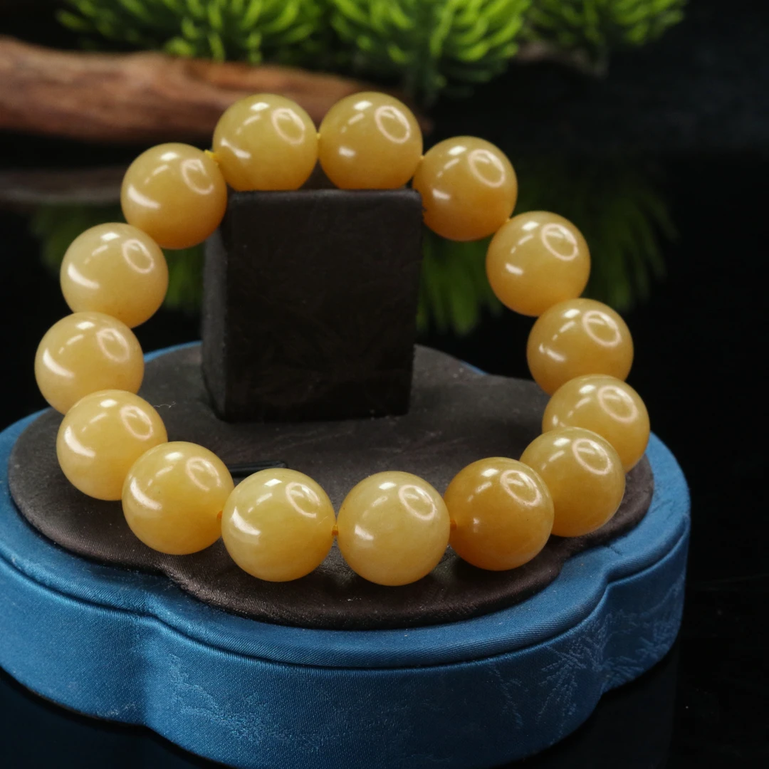 11和田玉且末甜糖手串/101334上海嘉禾拍卖