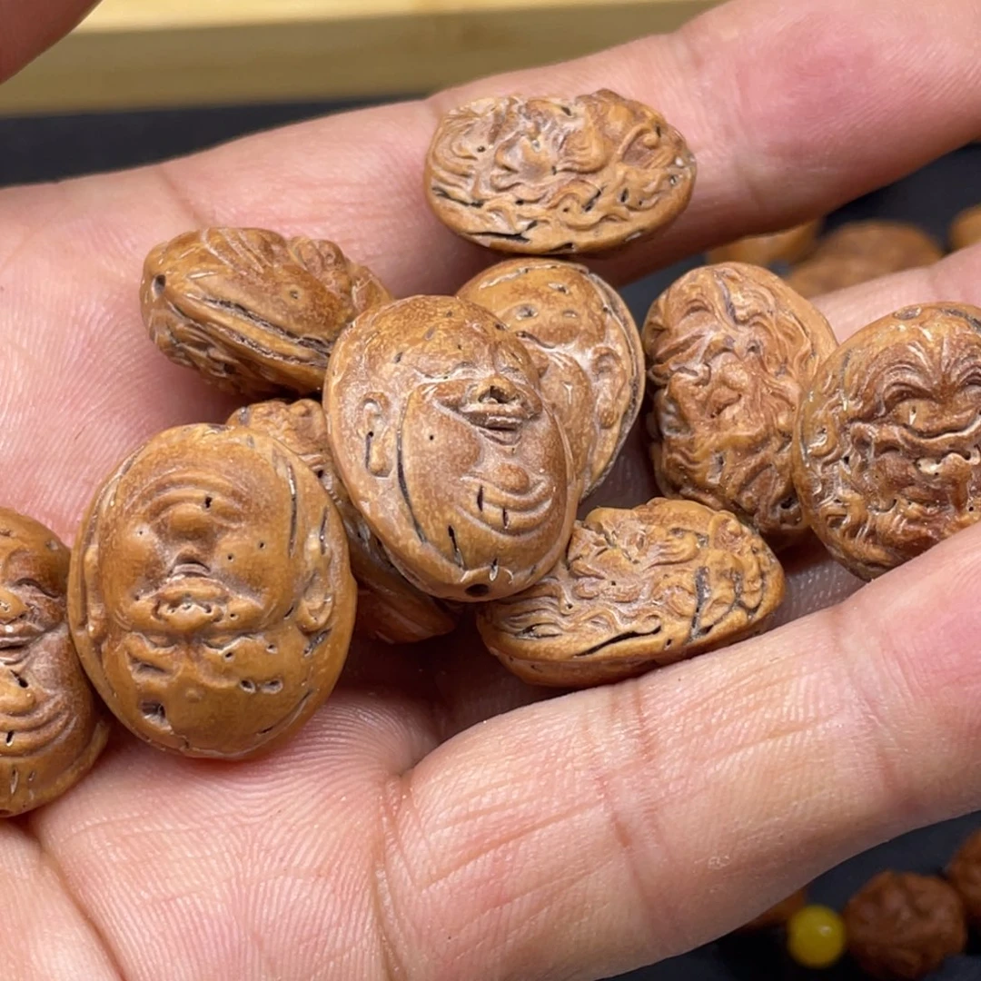 听***吗桃核雕刻罗汉手牌