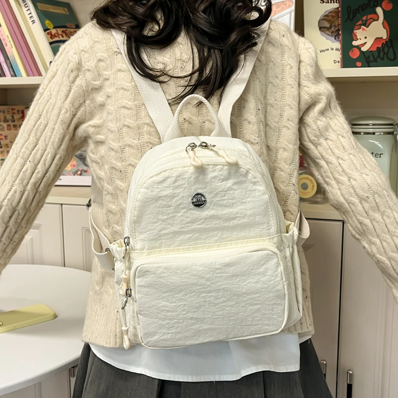 新品韩版旅游小型背包女双肩包简约百搭纯色迷你包多层通勤小包