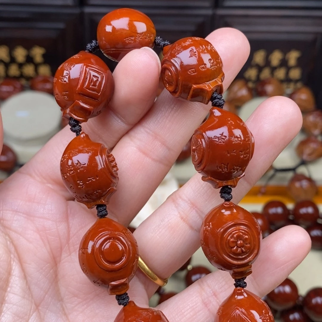 黑***K橄榄核吊坠把把壶