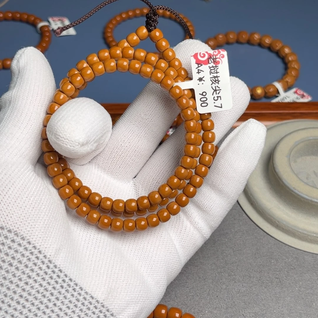 橄榄核手串5.7尺老挝核尖A4三花