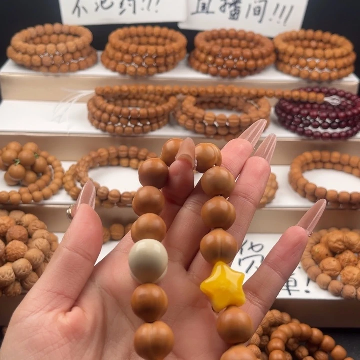 剑***.猴头核桃吊坠屁桃