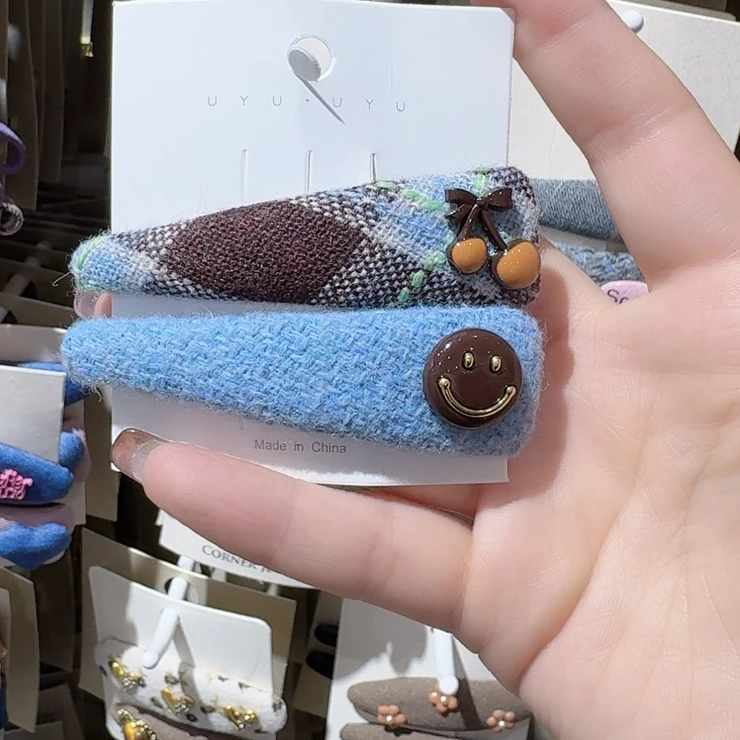 皮质铁合金笑脸拜拜夹