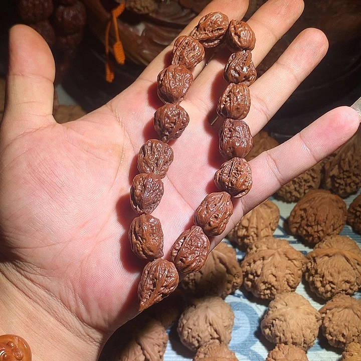 ****呢文玩核桃把件手串