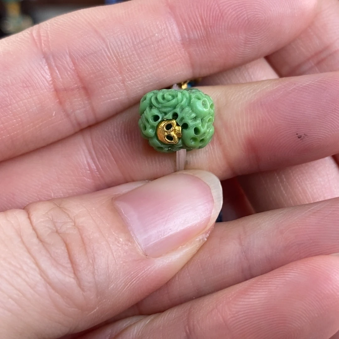 未镶嵌绿松石。菜籽万骷