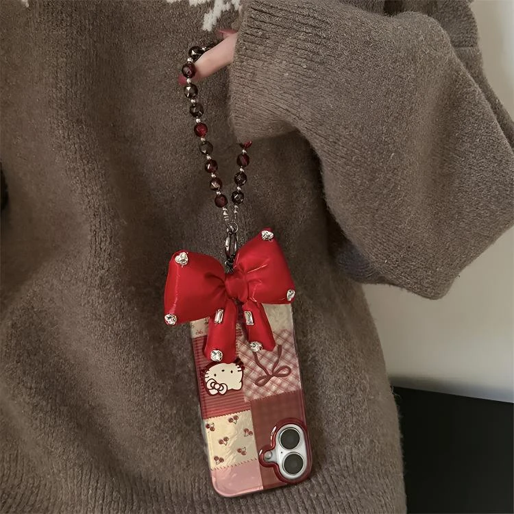 ins甜美少女樱桃蝴蝶结新年红适用iPhone16pro手机壳15promax手提