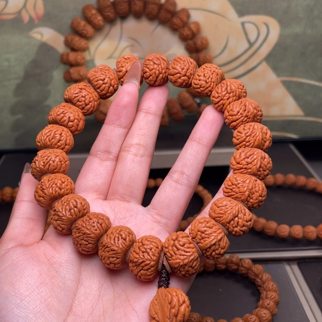 ***洪吊坠桃核麒麟纹手持