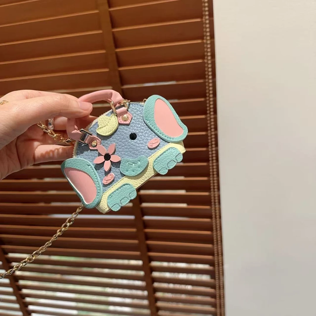 SP2504   头层牛皮手工可爱链条包挂件