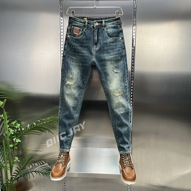 秋季潮牌刺绣百搭牛仔裤男2025新款痞帅锥形萝卜裤弹力修身长裤子