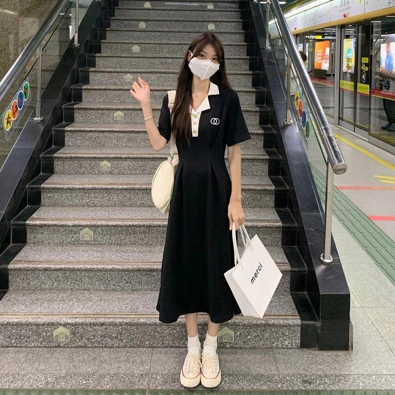 夏季新款纯欲学院风收腰显瘦POLO领短袖设计感黑色长裙A字裙子女