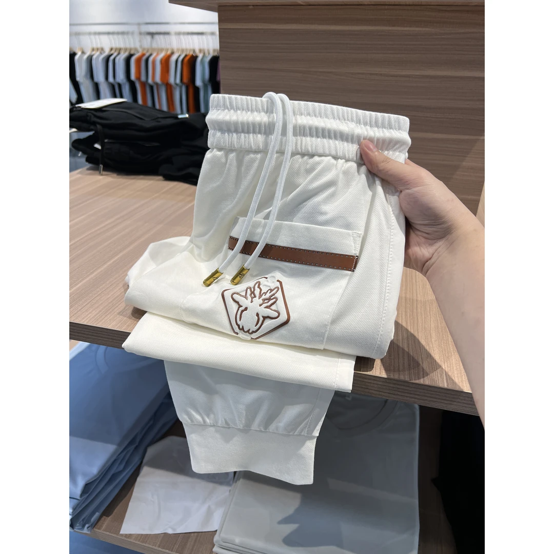 嘻哈哥夏季薄款冰丝白色裤子男修身束脚高端欧货休闲九分裤男士